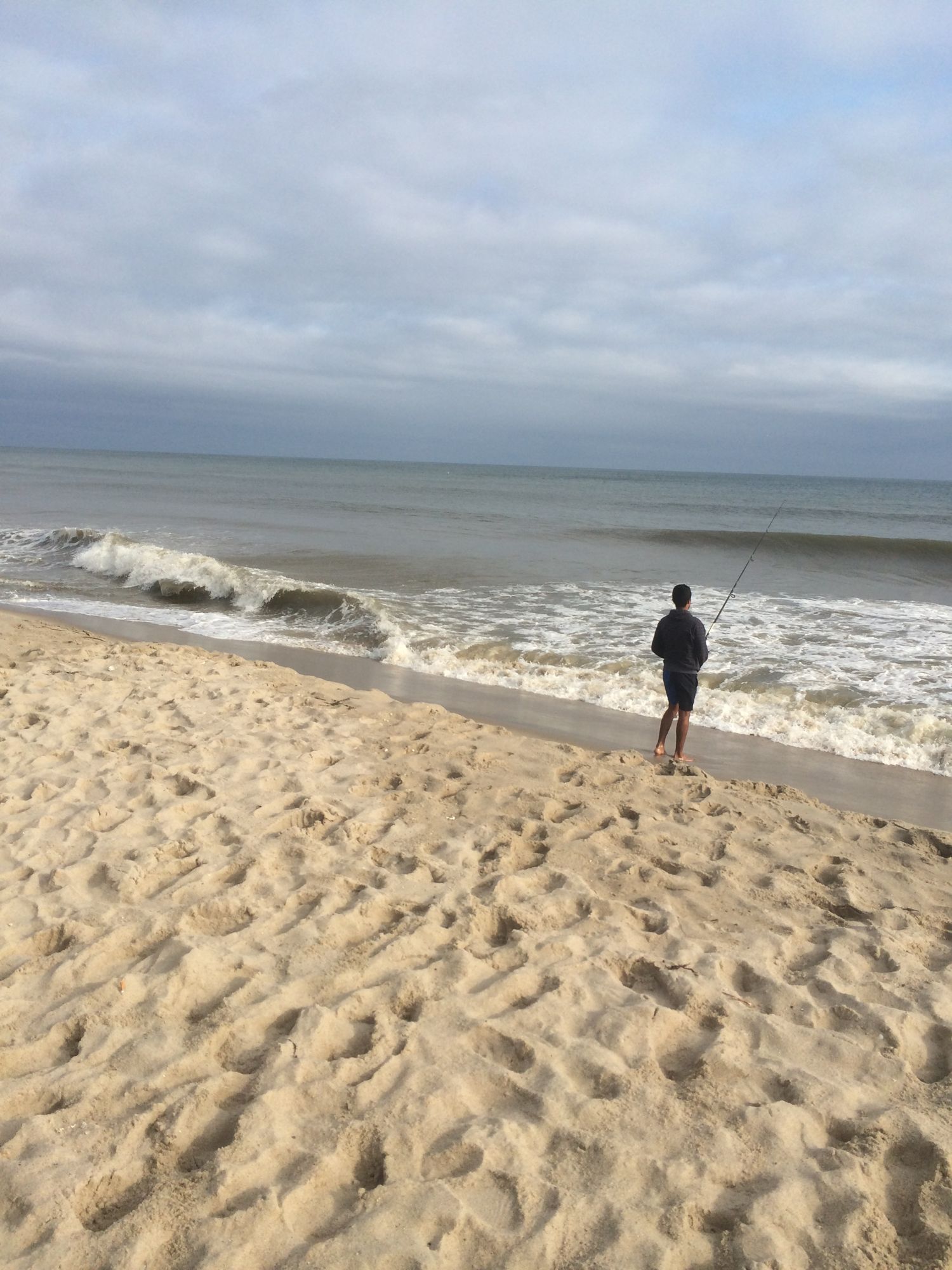 Surf casting at dawn